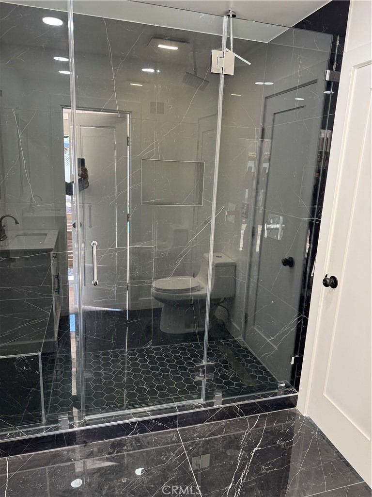 5230 Seville Avenue Encino, CA 91316 - Photo 41 of 61 a bathroom with a shower