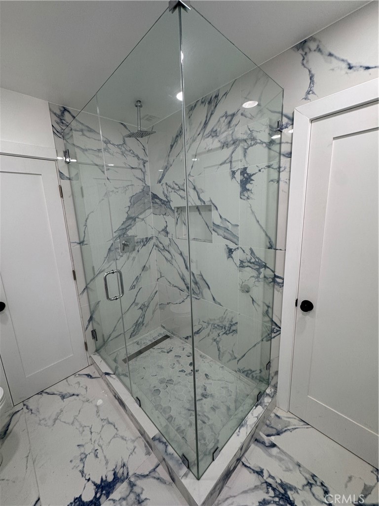 5230 Seville Avenue Encino, CA 91316 - Photo 52 of 61 a bathroom with a shower