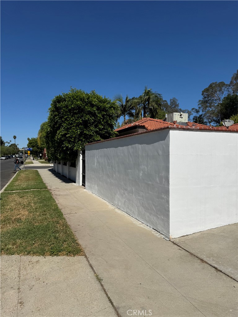 5230 Seville Avenue Encino, CA 91316 - Photo 6 of 61 front view of a house with a yard