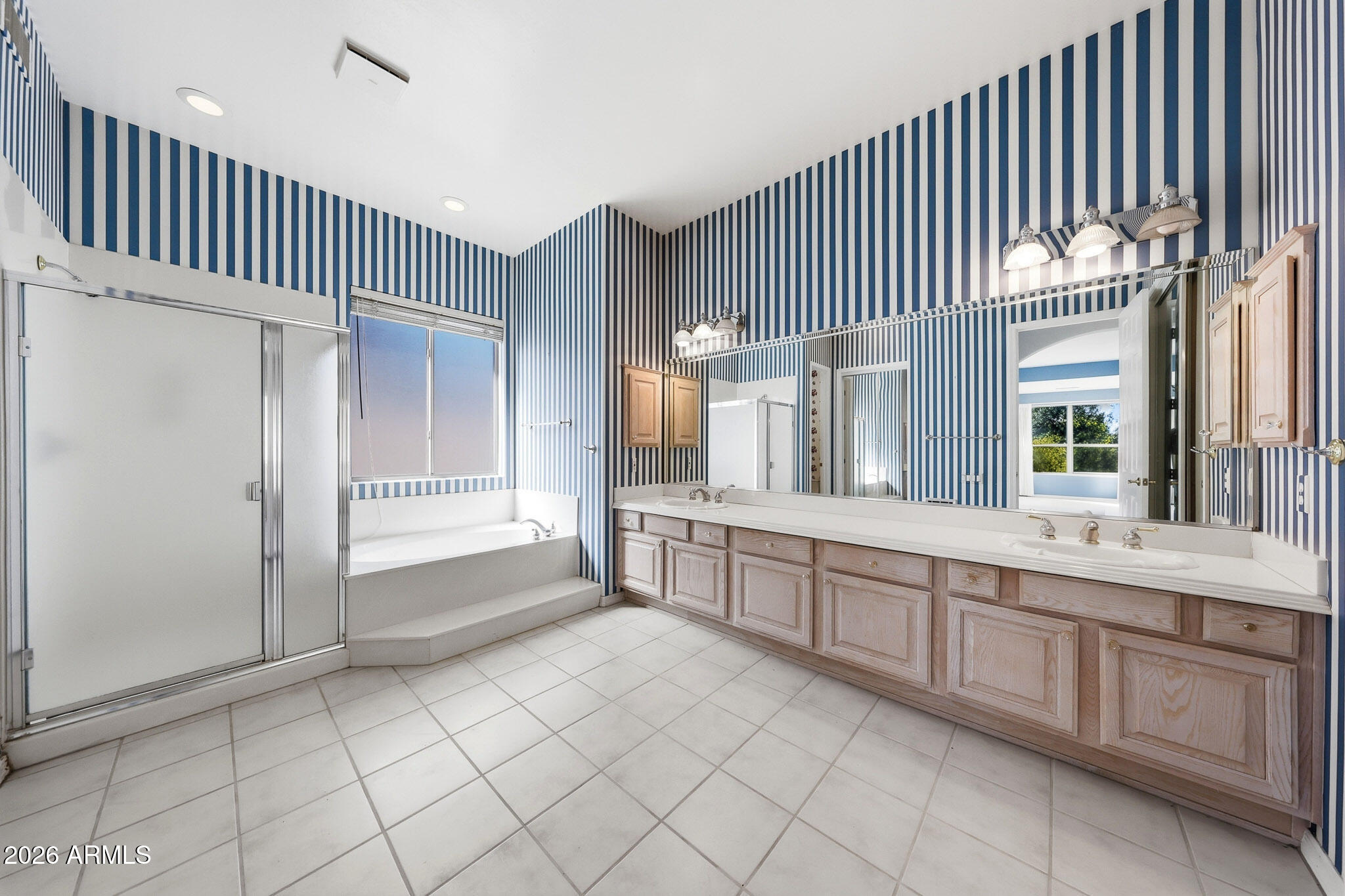 4149 North 49th Way Phoenix, AZ 85018 - Photo 11 of 25 a large white kitchen with cabinets a sink and dishwasher