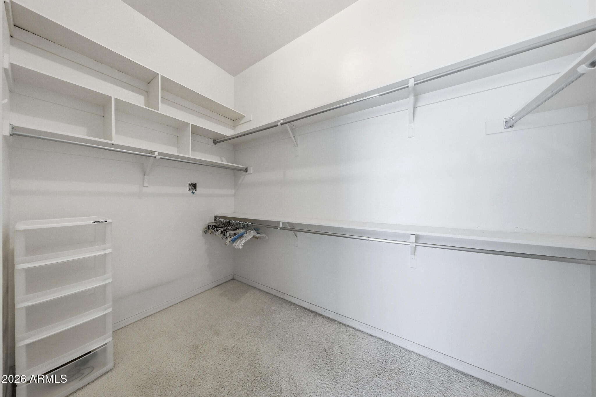 4149 North 49th Way Phoenix, AZ 85018 - Photo 12 of 25 a view of an empty walk in closet