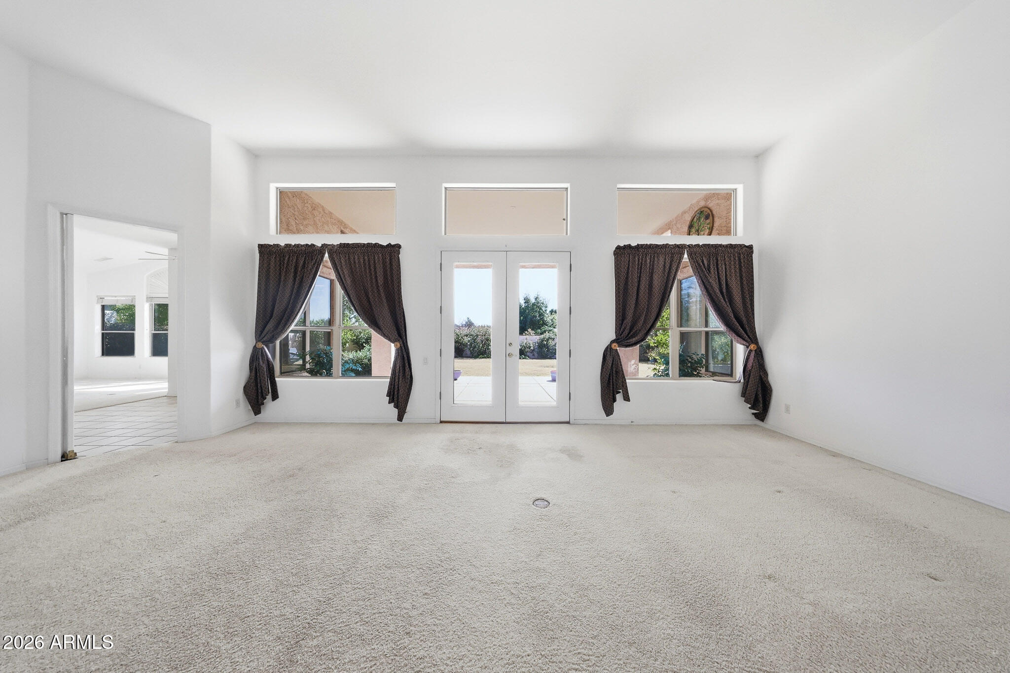4149 North 49th Way Phoenix, AZ 85018 - Photo 5 of 25 an entryway and livingroom with furniture