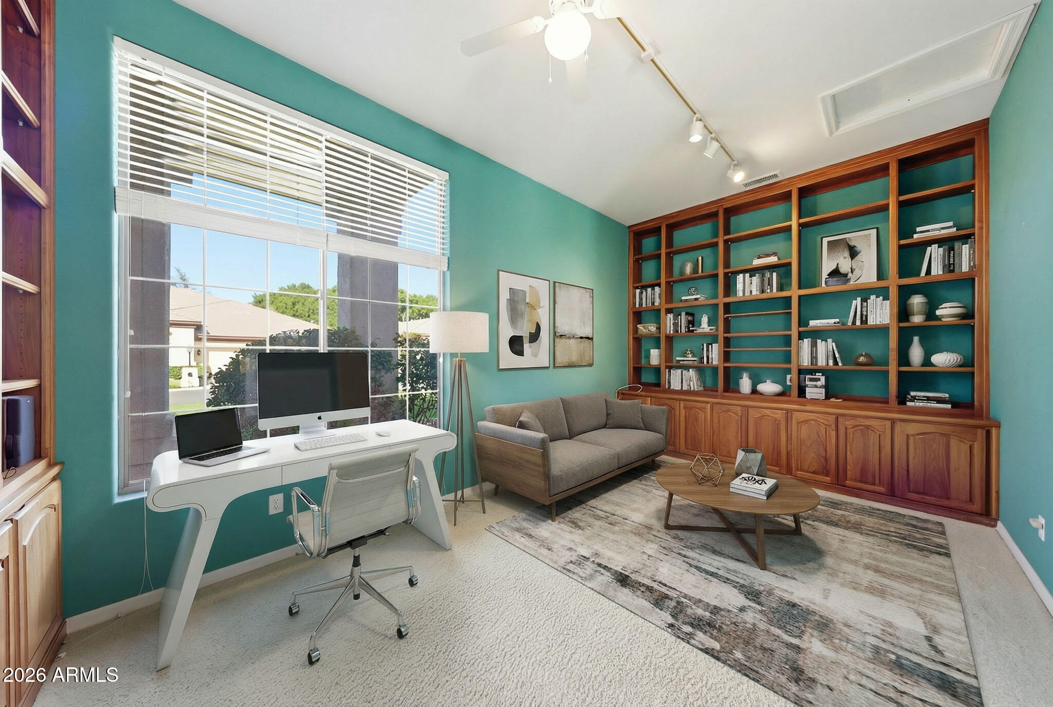 4149 North 49th Way Phoenix, AZ 85018 - Photo 7 of 25 a work room with furniture and a window