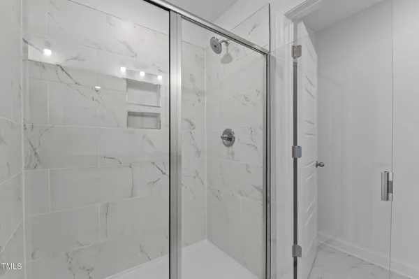 a view of a room that has a window in it