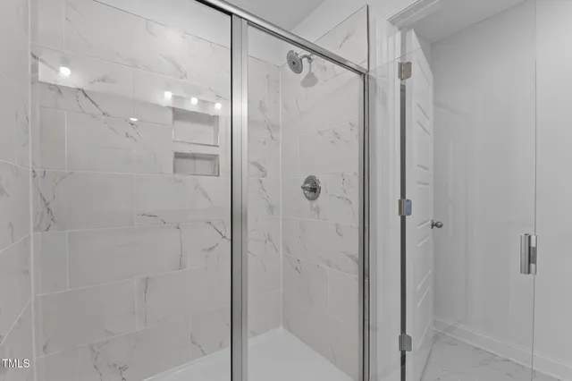 a view of a room that has a window in it