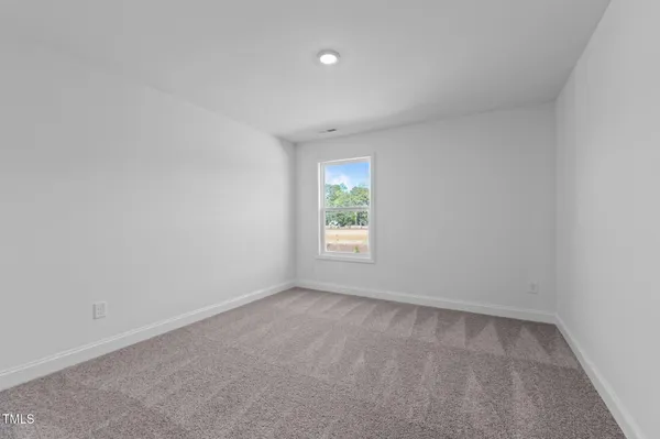 a bathroom with a granite countertop sink a toilet and bathtub