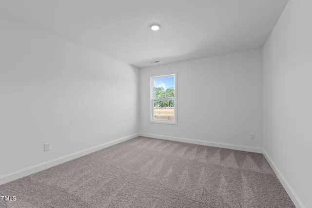 a bathroom with a granite countertop sink a toilet and bathtub