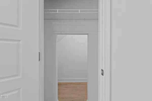 a view of empty room with windows