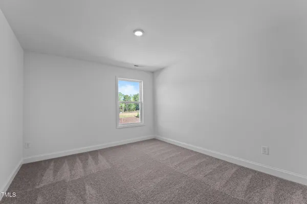 a bathroom with a sink a mirror and a toilet