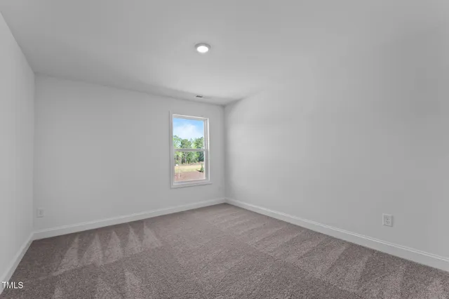a bathroom with a sink a mirror and a toilet