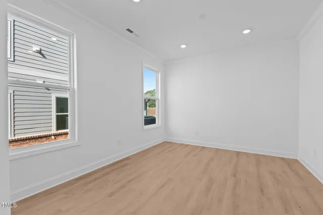 an empty room with a sink