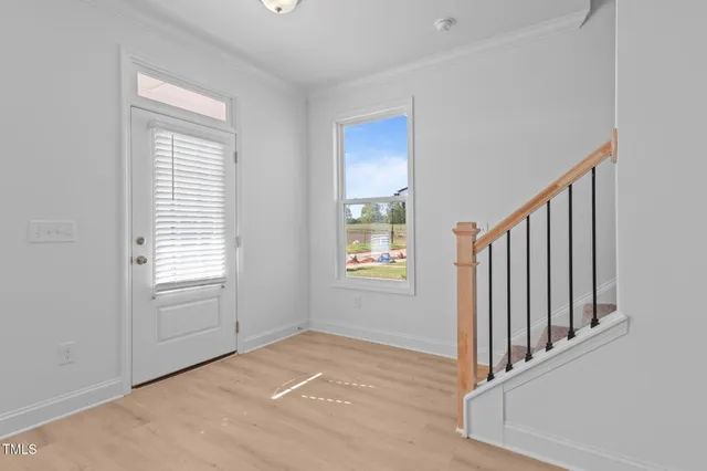 a front view of a house with a garage