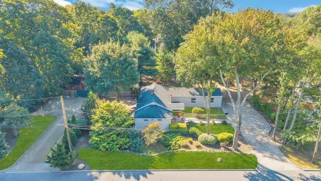 a view of a houses with a yard