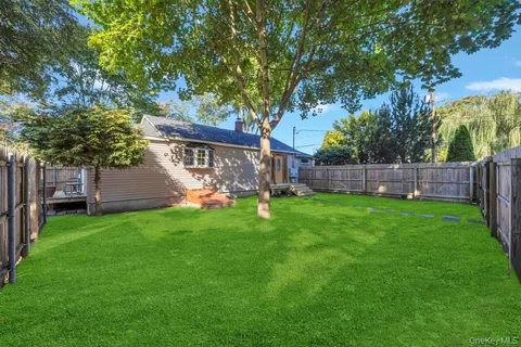 a view of garden with patio