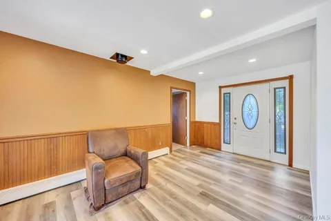 a view of livingroom with furniture and wooden floor