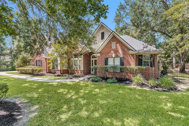 a front view of a house with yard