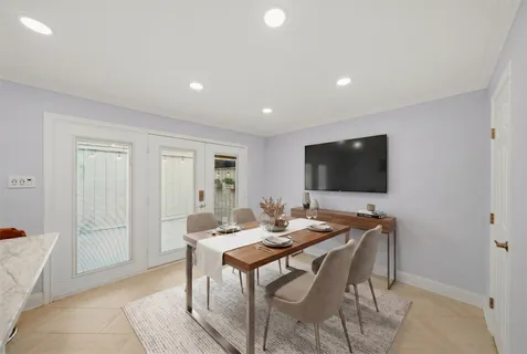 a view of a dining room with furniture
