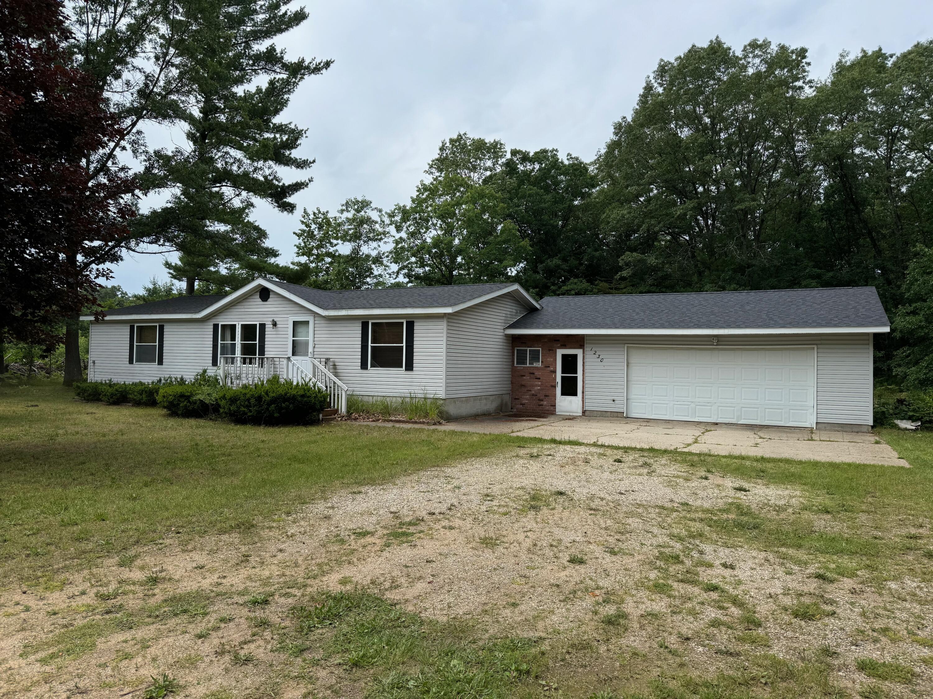 1230 Seaman Road Wellston, MI 49689 - Photo 1 of 36 IMG_5440