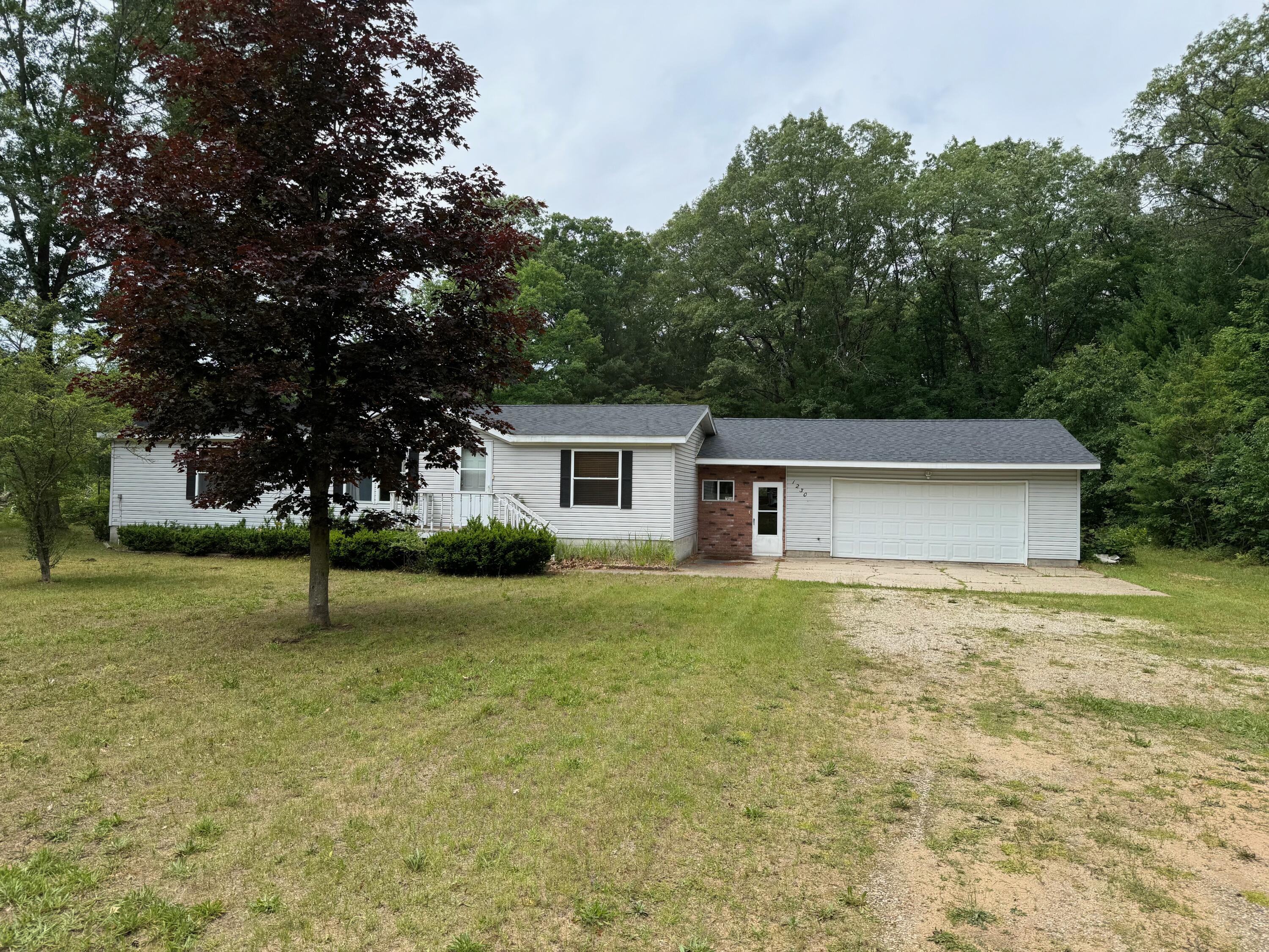 1230 Seaman Road Wellston, MI 49689 - Photo 3 of 36 IMG_5441