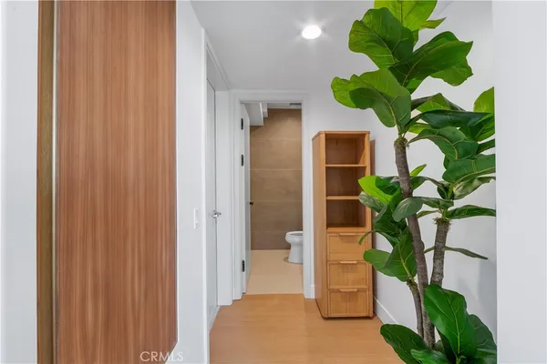 a view of living room with a potted plant