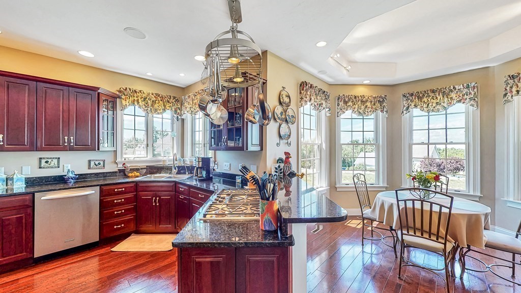 290 Three Rivers Road Wilbraham, MA 01095 - Photo 11 of 42 a large kitchen with lots of counter space and windows