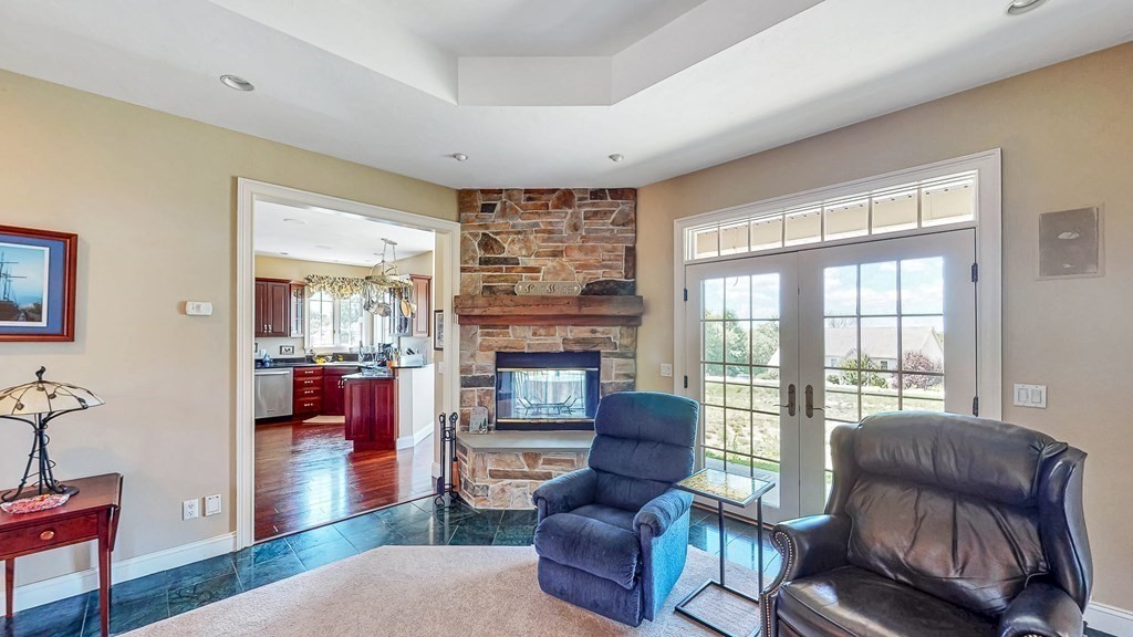 290 Three Rivers Road Wilbraham, MA 01095 - Photo 15 of 42 a living room with furniture and a fireplace