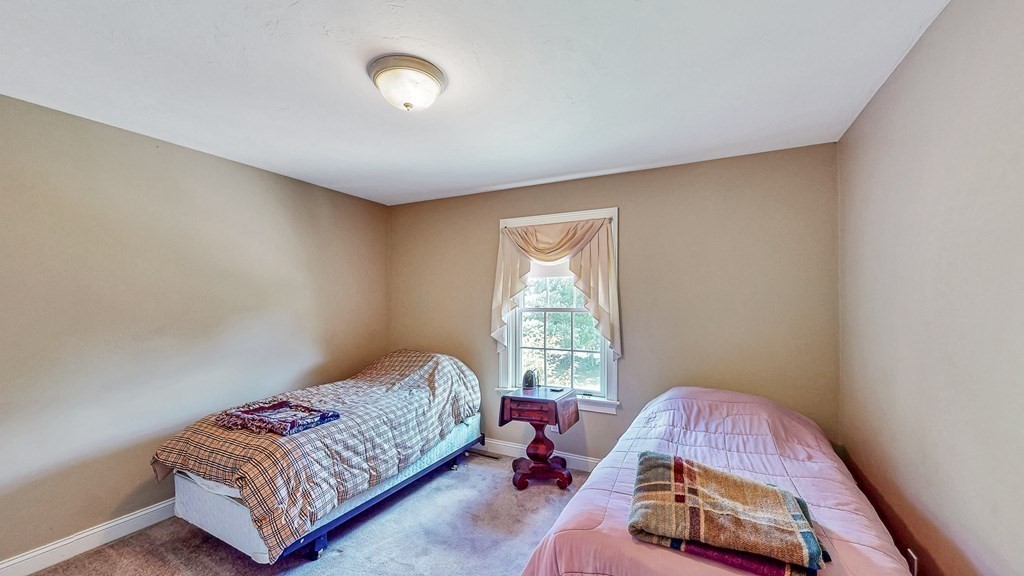 290 Three Rivers Road Wilbraham, MA 01095 - Photo 28 of 42 a bedroom with bed and a window
