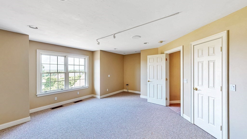 290 Three Rivers Road Wilbraham, MA 01095 - Photo 33 of 42 a view of an empty room with a window
