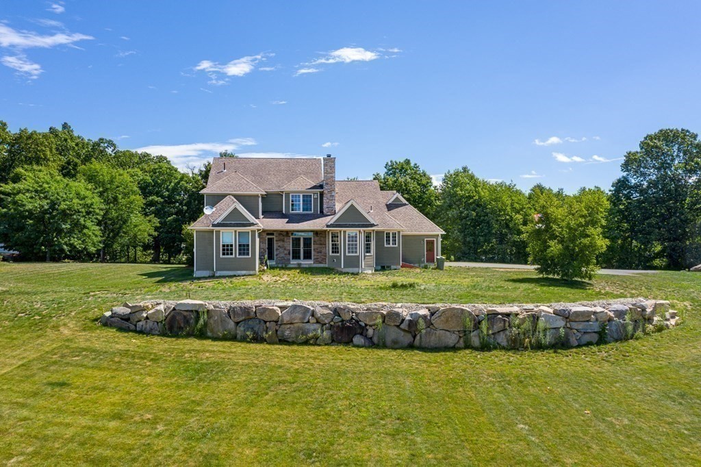 290 Three Rivers Road Wilbraham, MA 01095 - Photo 36 of 42 a front view of a house with a garden