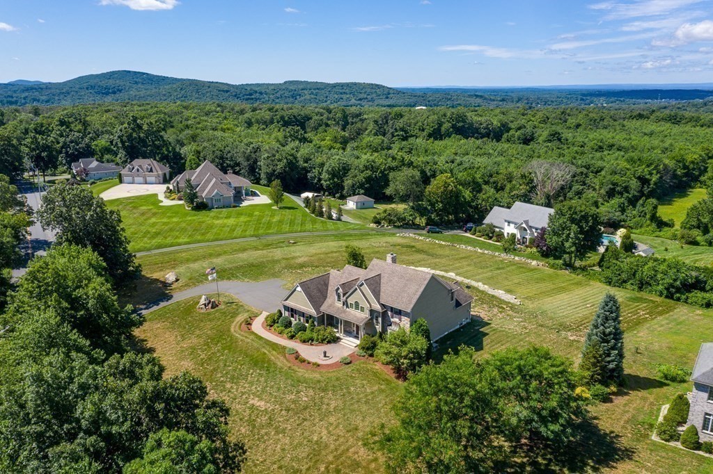 290 Three Rivers Road Wilbraham, MA 01095 - Photo 39 of 42 a view of a house with a yard and a mountain