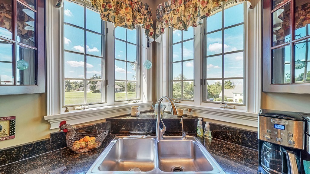 290 Three Rivers Road Wilbraham, MA 01095 - Photo 10 of 42 a kitchen with a sink and a large window