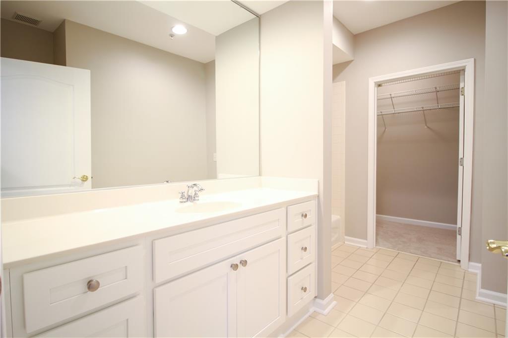 225 East Ponce De Leon Avenue, Unit 325 Decatur, GA 30030 - Photo 14 of 34 a bathroom with a sink and a mirror
