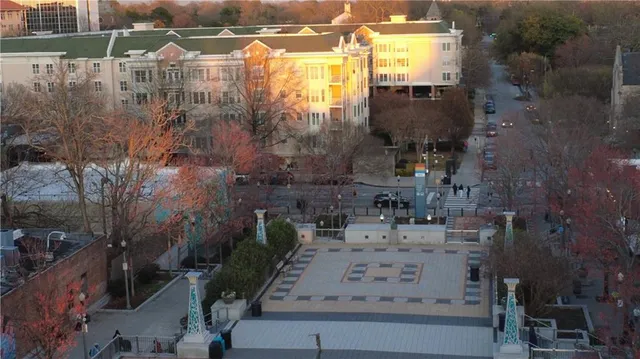 a view of a back yard of the patio and a fountain