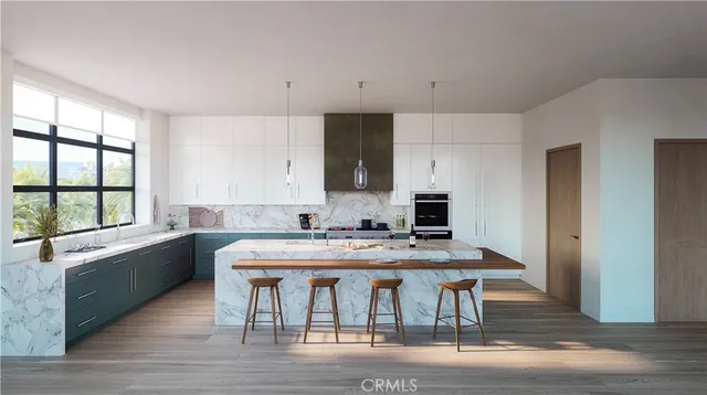 a view of a kitchen with granite countertop a stove top oven a sink and dishwasher with wooden floor