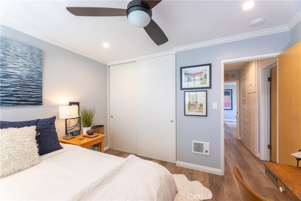 2772 2nd Street, Unit 2G Long Beach, CA 90803 - Photo 18 of 53 a bedroom with a bed and wooden floor
