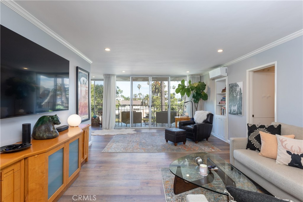 2772 2nd Street, Unit 2G Long Beach, CA 90803 - Photo 2 of 53 a living room with furniture and a large window