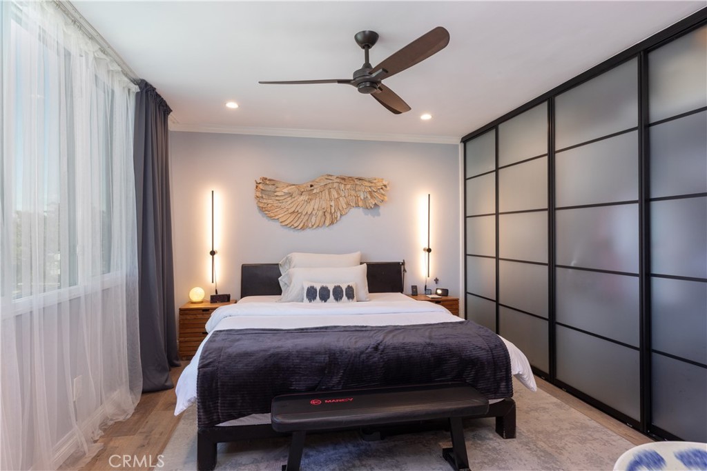 2772 2nd Street, Unit 2G Long Beach, CA 90803 - Photo 23 of 53 a bedroom with a bed and a window