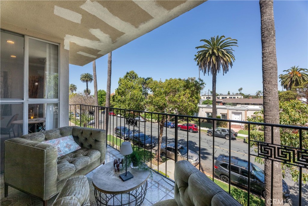 2772 2nd Street, Unit 2G Long Beach, CA 90803 - Photo 27 of 53 a view of a balcony with chairs and a potted plant