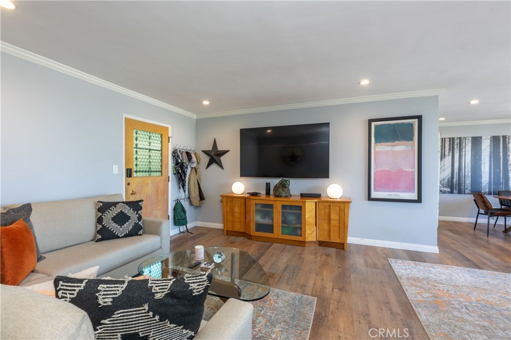 2772 2nd Street, Unit 2G Long Beach, CA 90803 - Photo 3 of 53 a living room with furniture and a flat screen tv