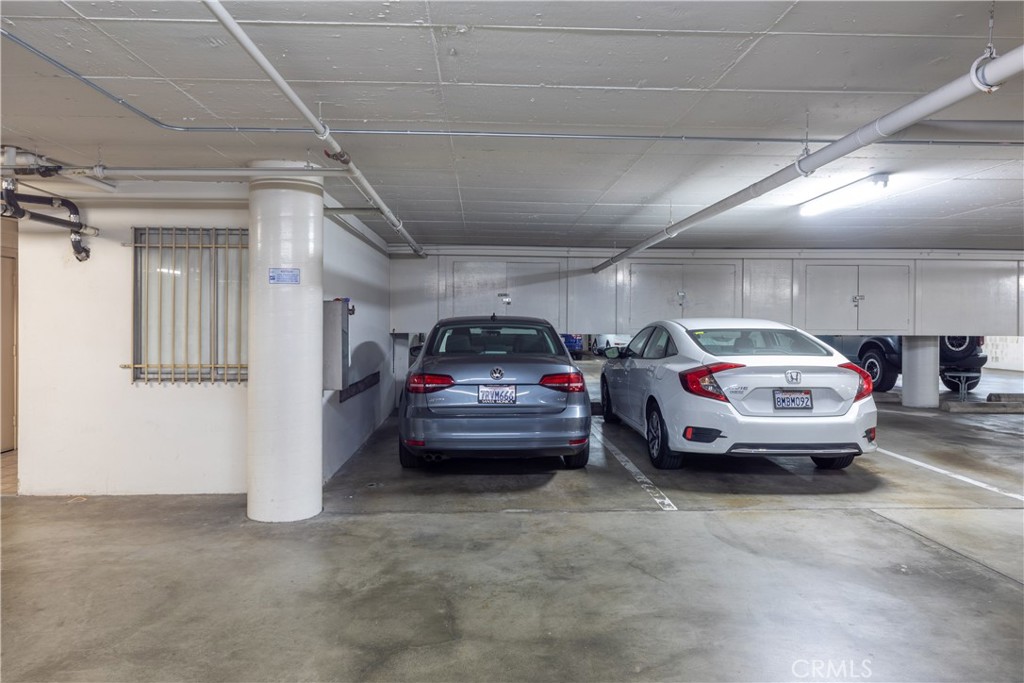 2772 2nd Street, Unit 2G Long Beach, CA 90803 - Photo 37 of 53 a view of parking garage with cars parked