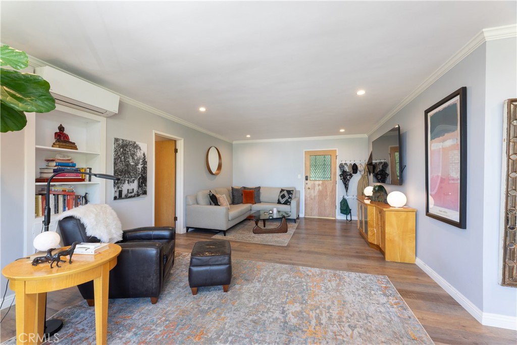 2772 2nd Street, Unit 2G Long Beach, CA 90803 - Photo 4 of 53 a living room with furniture and a wooden floor