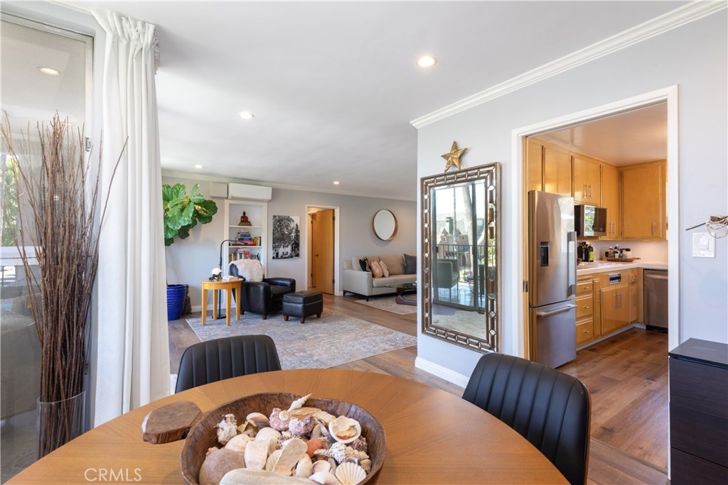2772 2nd Street, Unit 2G Long Beach, CA 90803 - Photo 10 of 53 a living room with furniture and a large window