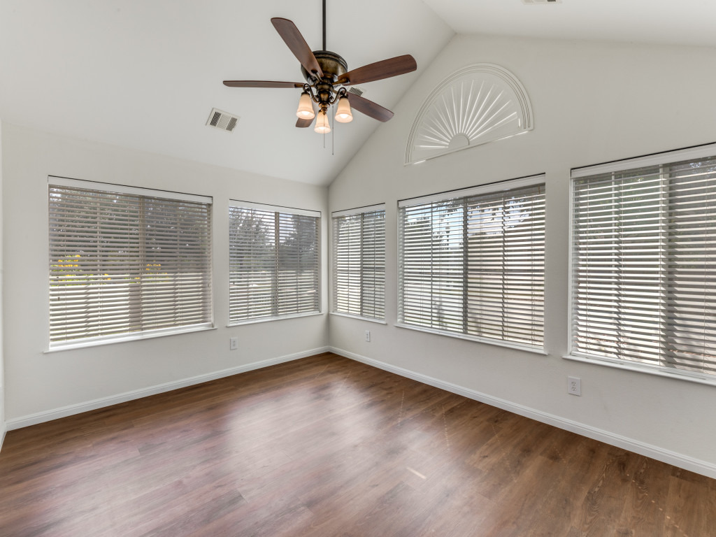 30 Wildwood Drive, Unit 174 Georgetown, TX 78633 - Photo 18 of 34 a view of an empty room with wooden floor and a window