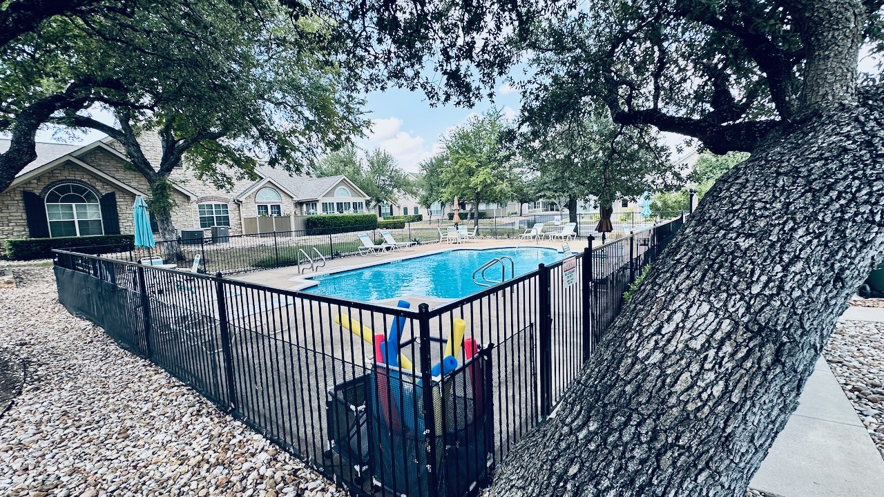 30 Wildwood Drive, Unit 174 Georgetown, TX 78633 - Photo 30 of 34 a view of a house with wooden deck