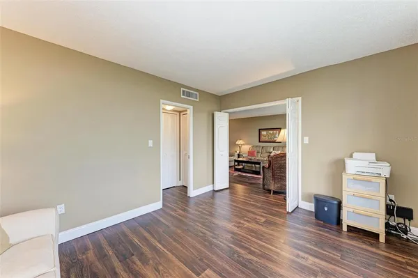 a view of a livingroom with wooden floor