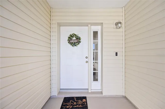 a view of a door and a window