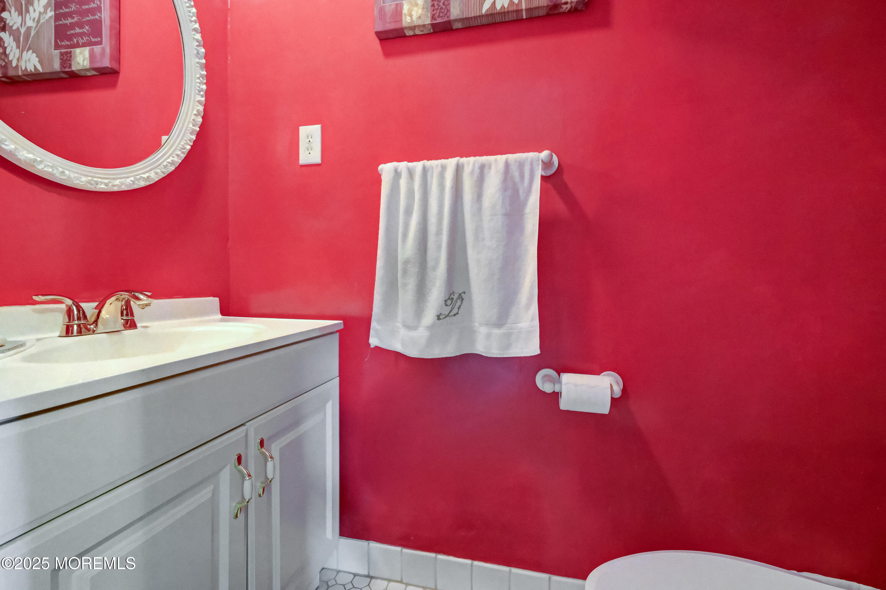 515 Line Road Aberdeen, NJ 07747 - Photo 21 of 30 a bathroom with a sink mirror and toilet