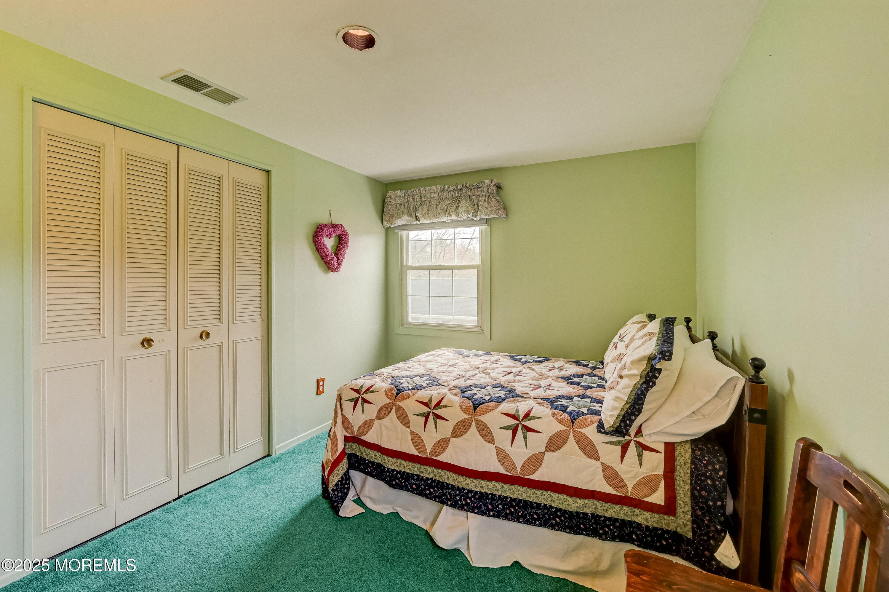 515 Line Road Aberdeen, NJ 07747 - Photo 23 of 30 a bedroom with a bed and a window