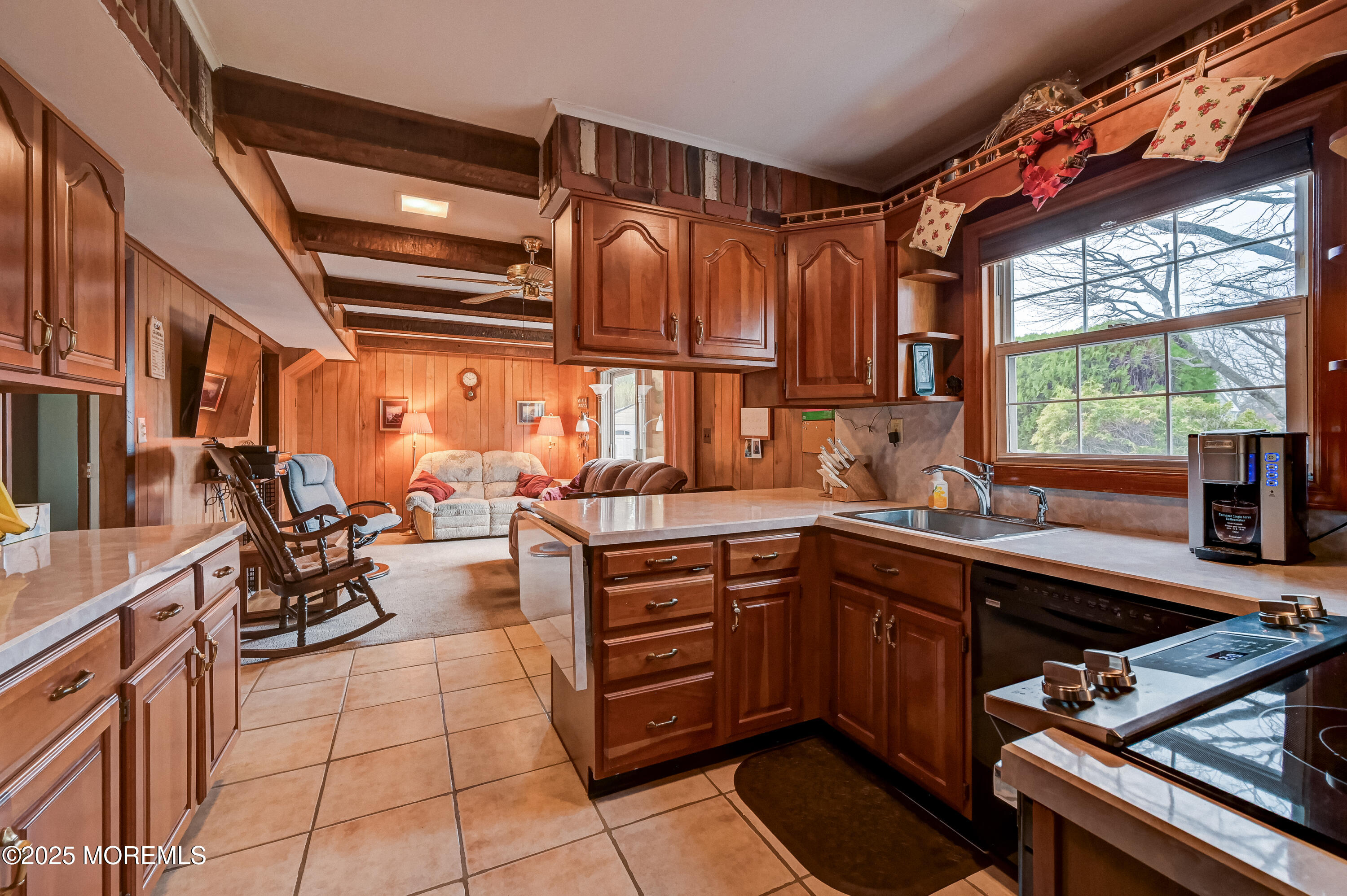 515 Line Road Aberdeen, NJ 07747 - Photo 5 of 30 a kitchen with stainless steel appliances a sink stove and cabinets
