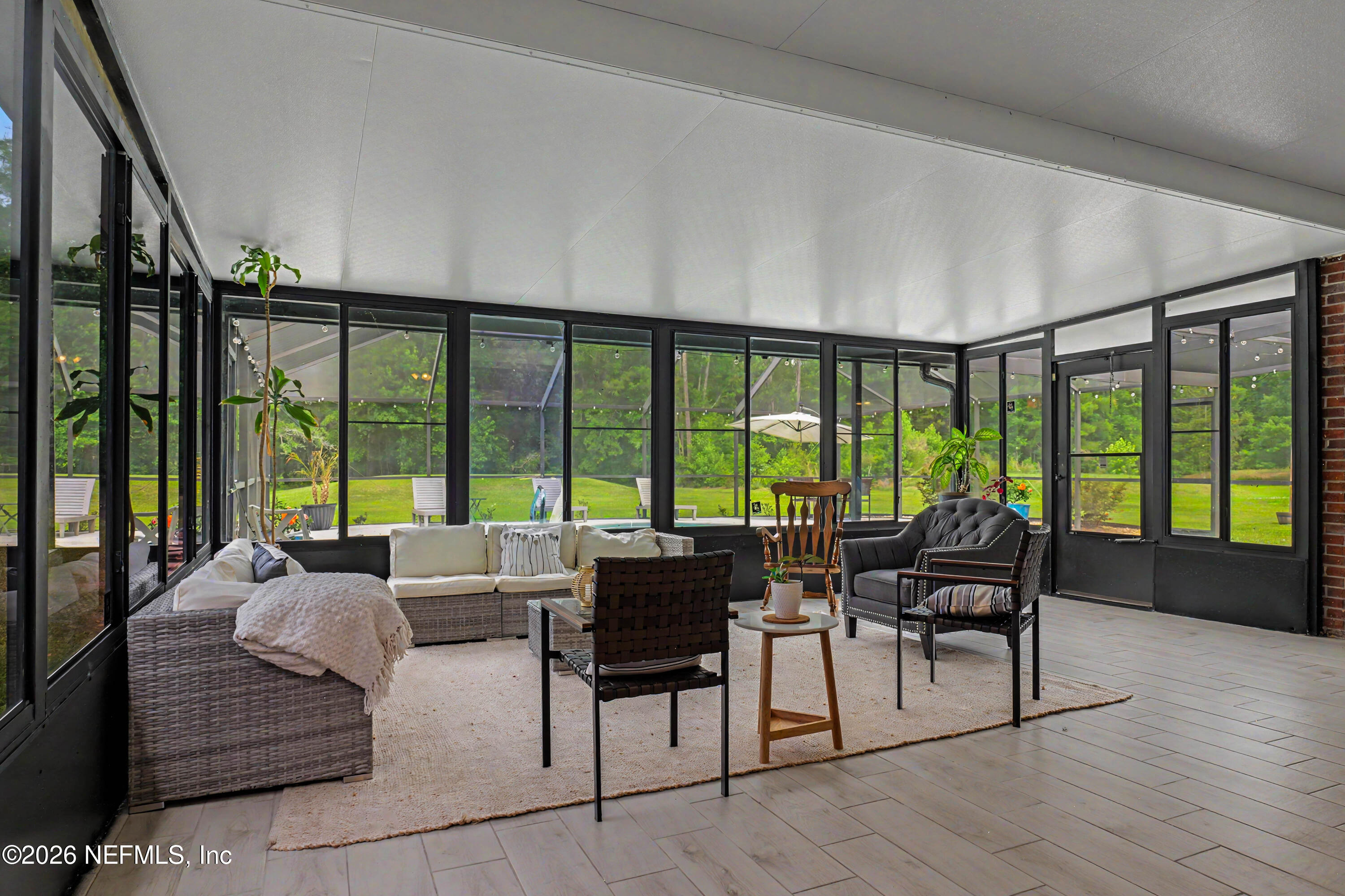 12573 Sampson Road Jacksonville, FL 32218 - Photo 58 of 87 Covered Screened Patio